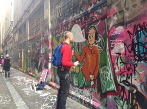Artist at work in the lanes by Melbourne - photo by NotaHati