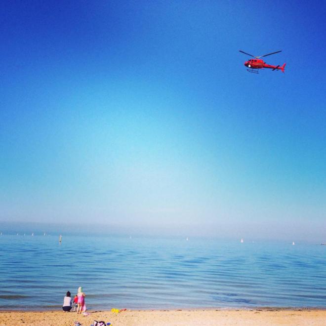 Helicopter, sun, sea, sand and sun seekers on a Sunday morning - photo by NotaHati